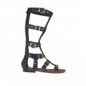 Woman's gladiator open shoe with zipper, studs and buckles in black leather and green printed leather heel 1