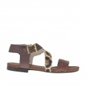 Woman's strap sandal in spotted, dark brown, printed tan leather heel 1