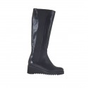 Woman's boot with elastic bands in black leather wedge heel 5
