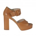 Woman's open shoe in tan brown leather with buckle and platform heel 9