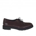 Woman's laced derby shoe in maroon leather heel 3