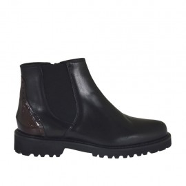 Woman's ankle boot with elastic band and zipper in black leather and maroon patent leather heel 3 - Available sizes:  32