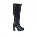 Woman's boot with half zipper in black leather heel 10