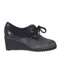 Woman's laced shoe in grey suede and black leather wedge heel 6