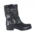 Woman's ankle boot with buckles and studs in black leather heel 3