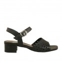 Woman's strap sandal in black pierced leather heel 3