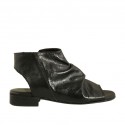 Woman's highfronted sandal with zipper in black leather heel 2