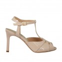Woman's strap sandal in nude patent leather heel 8