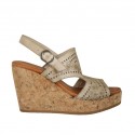 Woman's sandal in taupe pierced leather with platform and wedge 9
