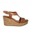Woman's sandal in tan pierced leather with platform and wedge heel 7