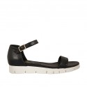 Woman's open strap shoe in black leather wedge heel 2