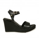 Woman's sandal in black leather with strap, platform and wedge heel 8
