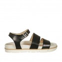 Woman's sandal with strap in black leather wedge heel 2