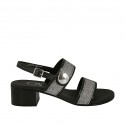 Woman's sandal with strap, bands and button in silver laminated fabric and black leather with heel 4