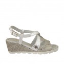 Woman's sandal with crossed straps in silver printed suede and laminated leather wedge heel 5