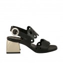 Woman's sandal in black pierced leather heel 5