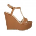 Woman's sandal in tan brown leather with strap, platform and wedge heel 12