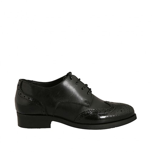 Woman's laced pointy derby shoe in black leather and patent leather with Brogue decorations heel 3 - Available sizes:  44, 45