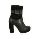 Woman's ankle boot with buckle, zipper and platform in black leather and suede heel 10