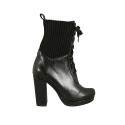 Woman's laced ankle boot with platform in black leather and elastic fabric heel 9