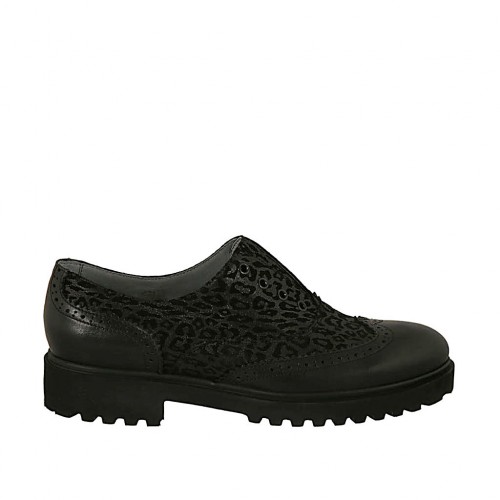 Scarpa accollata da donna con elastici in pelle nera e camoscio stampato maculato nero tacco 3 - Misure disponibili: 45