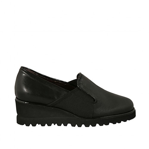 Scarpa accollata da donna con elastici in pelle nera zeppa 5 - Misure disponibili: 32, 44