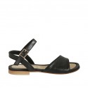 Woman's strap sandal in black leather heel 1