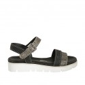 Woman's strap sandal in black printed leather and striped printed suede wedge heel 3