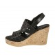 Woman's sandal in black-colored pierced leather with platform and wedge 9 - Available sizes:  32, 33