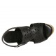 Woman's sandal in black-colored pierced leather with platform and wedge 9 - Available sizes:  32, 33