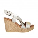 Woman's sandal in platinum laminated leather with accessory, platform and wedge heel 9