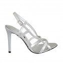Woman's sandal with crossed straps in silver laminated leather heel 9