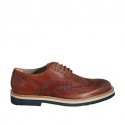 Herrenderbyschuh mit Schnürsenkeln und Broguemuster aus hellbraunem Leder und geflochtenem Leder