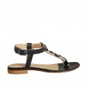 Woman's thong sandal in spotted and black leather heel 1