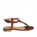 Woman's thong sandal in spotted and brown leather heel 1