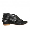 Woman's open shoe with zipper in black pierced leather heel 1
