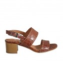 Woman's sandal in tan printed leather heel 4