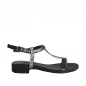 Woman's thong sandal with strap in black leather and striped printed suede heel 2