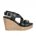 Woman's sandal in black leather with accessory, platform and wedge heel 9