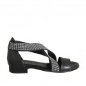Woman's open shoe with elastic bands and rhinestones in black leather heel 2