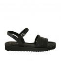 Woman's strap sandal in black leather wedge heel 3
