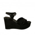 Woman's strap sandal in black laminated and printed suede with platform and wedge heel 9