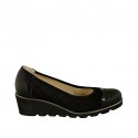 Woman's pump with studs in black pierced suede and leather wedge heel 4