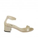 Woman's open shoe with strap in platinum laminated leather heel 4