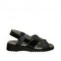 Woman's sandal with velcro straps in black suede and patent leather wedge heel 3