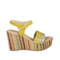 Woman's strap sandal with platform in yellow suede, yellow and platinum laminated leather and multicolored wedge heel 9