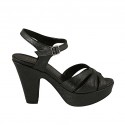 Woman's strap sandal with platform in black laminated leather heel 10