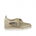 Woman's laced shoe in platinum laminated printed leather, suede and and pierced fabric wedge heel 3