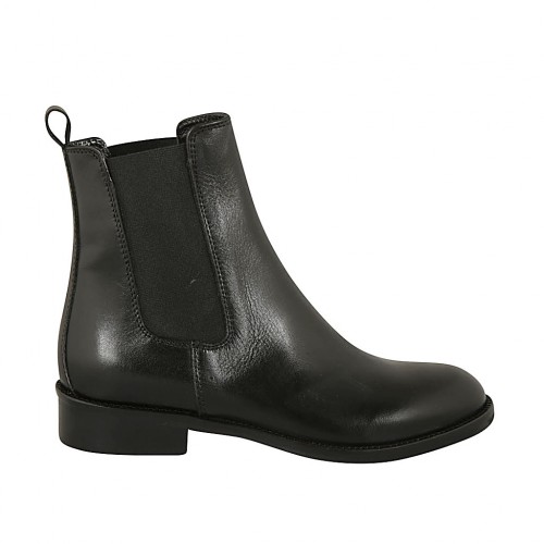 Woman's ankle boot in black leather with double elastic bands heel 3