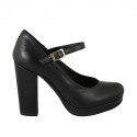Woman's strap pump with platform in black leather heel 10
